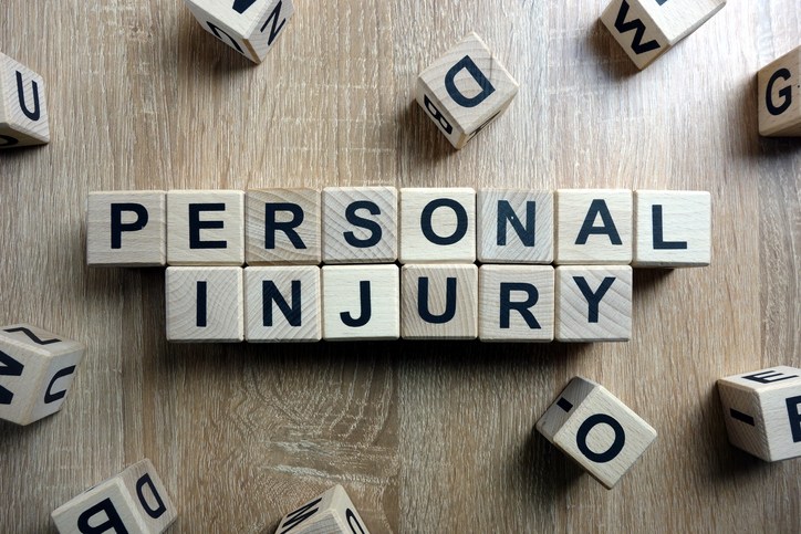 SHOULD I CONTACT AN ATTORNEY FOR A BRAIN INJURY? Words Personal injury in block letters