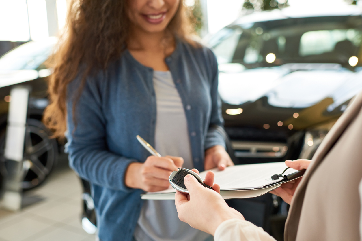 signing rental car agreement